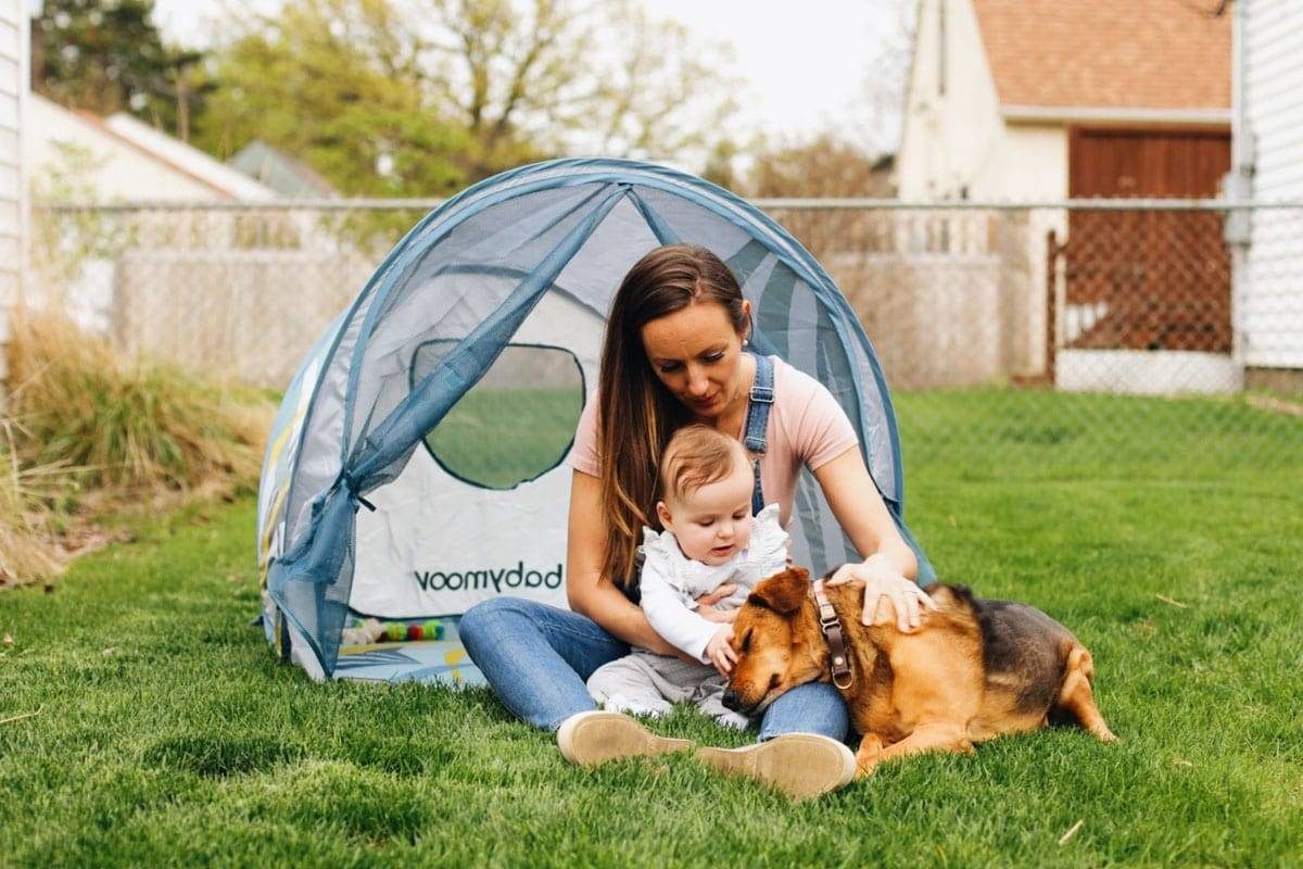 Lindsay and Solvi in front of a tent.