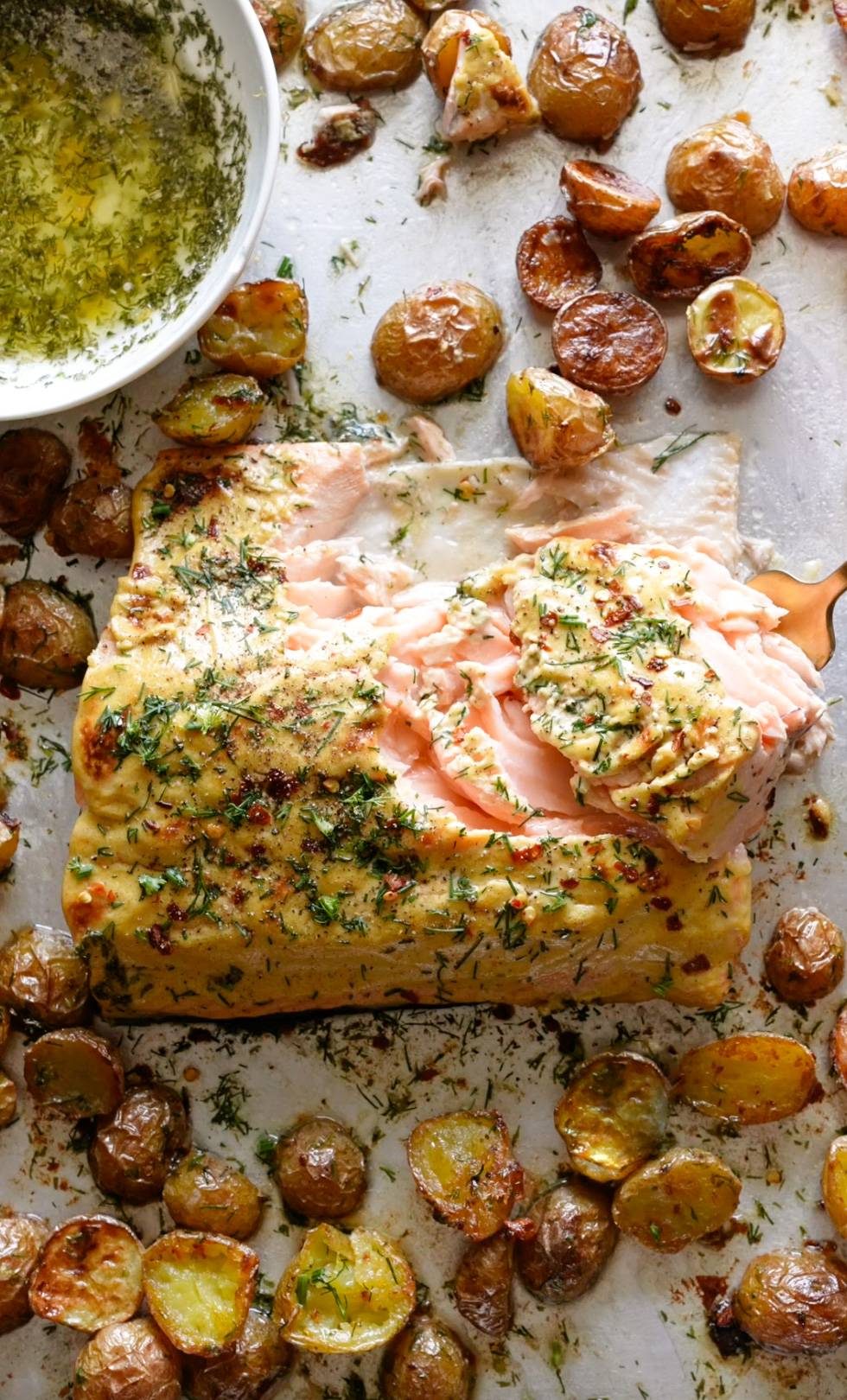 Dill salmon on a sheet pan with potatoes.