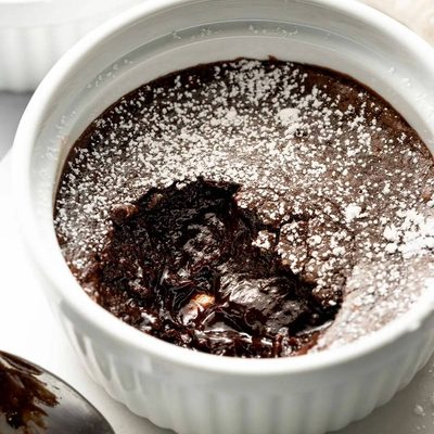 Brownie pudding in a ramekin.