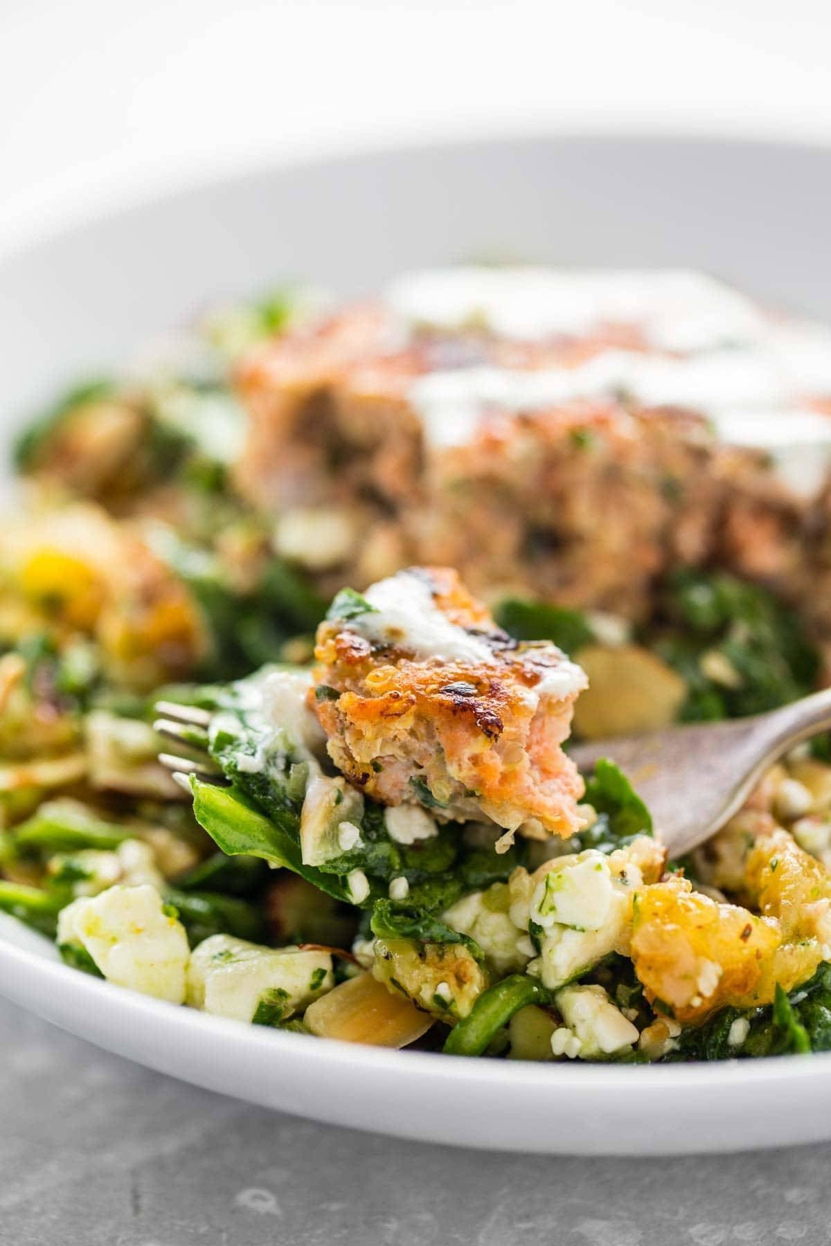 Lemon Herb Salmon Burger on a fork.